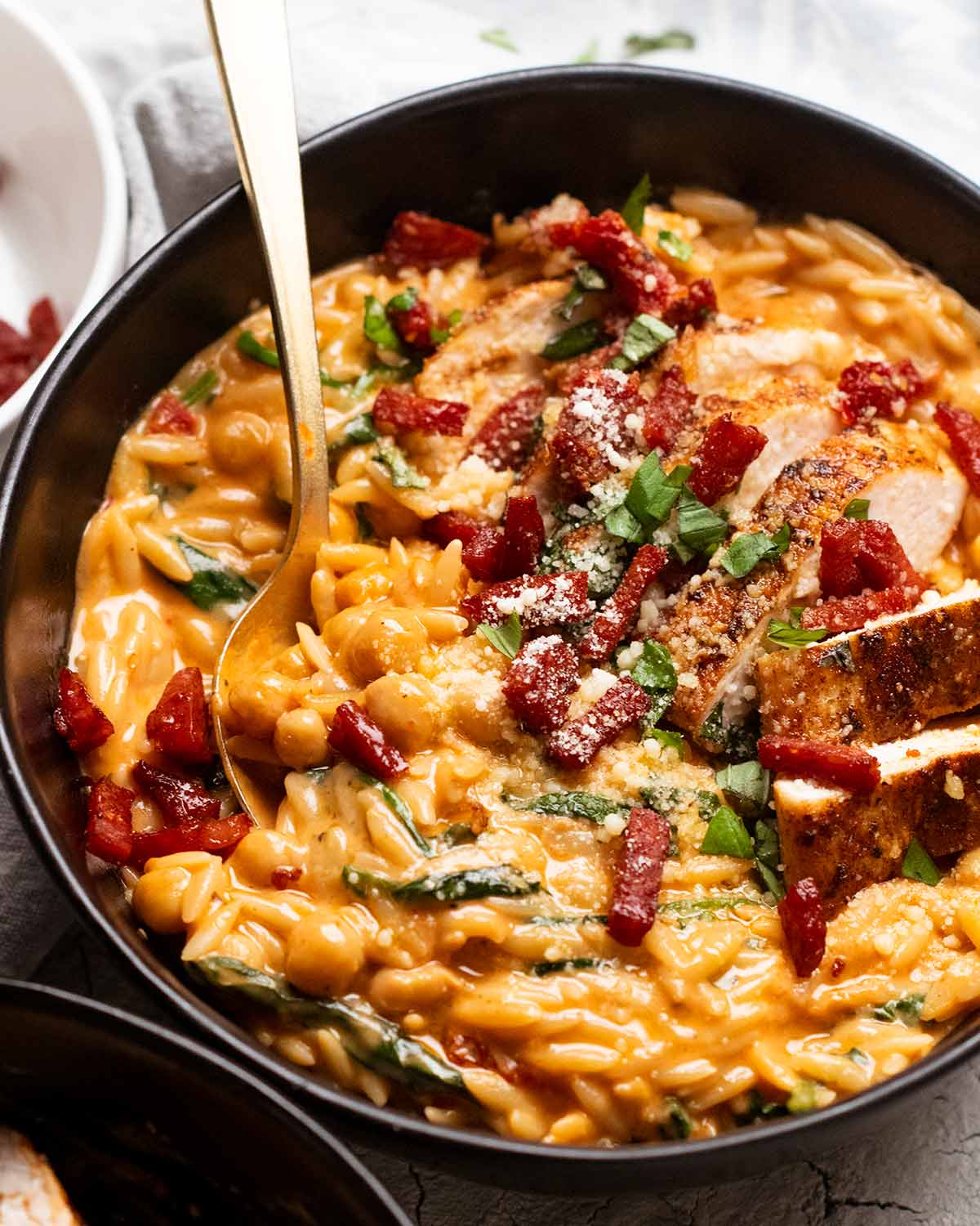 One pot chicken risoni with crispy salami